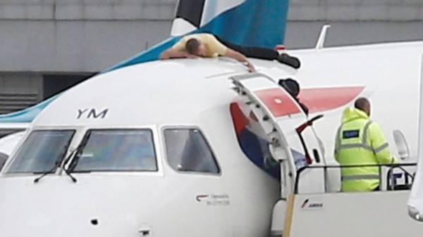 
                              Extinction Rebellion protester climbs on plane at London City Airport
                      