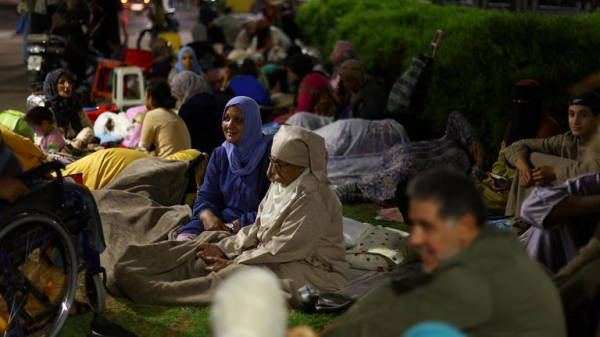 Morocco earthquake survivors sleep rough as rescuers battle to save people trapped in remote areas