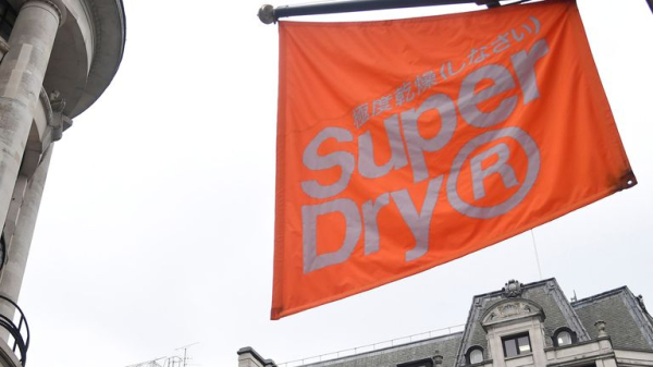 Struggling Superdry swings to annual loss and warns of little revenue growth this year